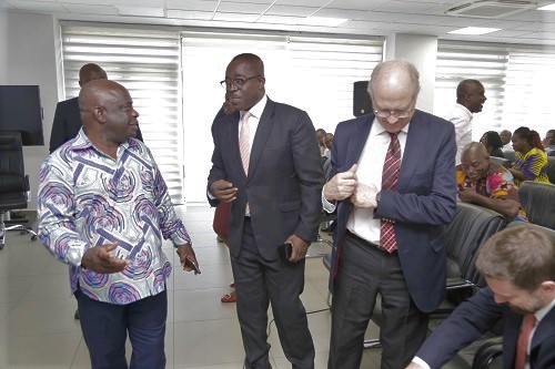 Mr William Owuraku Aidoo (middle), Deputy Minister of Energy in charge of Power, chatting with  Prof. Benjamin J. B. Nyarko (left), Director-General, Ghana Atomic Energy Commission, after the event. With them is Mr Anthony Stott (right), Team Leader, International Atomic Energy Agency (IAEA). Picture: EMMANUEL ASAMOAH ADDAI