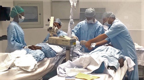 Surgeons busily operating on cataract patients at the Greater Accra Regional Hospital