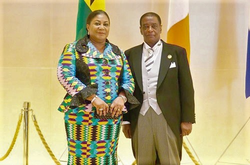 Mrs Rebecca Akufo-Addo poses with Mr Frank Okyere, Ghana’s Ambassador to Japan, after the ceremony at the Imperial Palace in Tokyo­