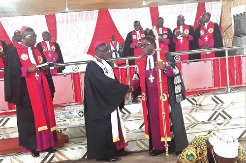 Most Rev. Dr Boafo (right) congratulating Rt Rev. Andam after his induction as Bishop of the Wenchi Diocese of the Methodist Church Ghana.