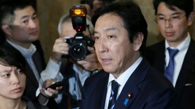  Isshu Sugawara spoke to reporters after resigning 