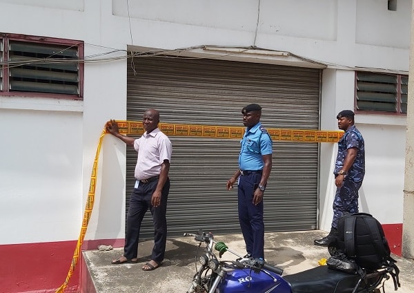 Officials of the GRA closing one of the companies