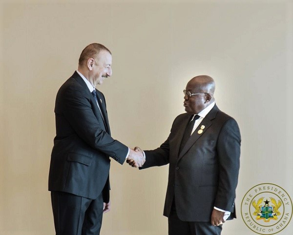 President Akufo-Addo (right) exchanging pleasantries with the President of Azerbaijan, Ilham Aliyev, at the NAM Conference  