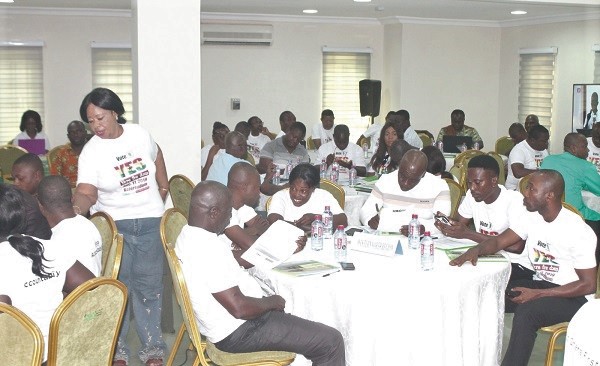  The trainers in their various group discussions. 