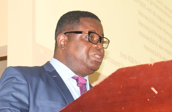 Prof. Peter Quartey, Director, Institute of Statistical, Social and Economic Research (ISSER), speaking on the state of the economy at the forum. Picture: Maxwell Ocloo