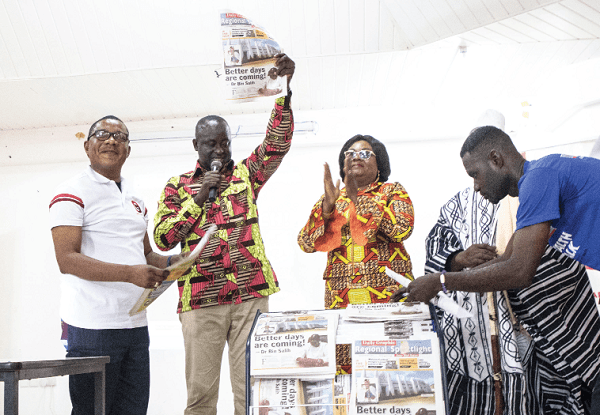 Dr Hafiz Bin Salih (2nd left), the Upper West Regional Minister, launching  the second edition of the Graphic Regional Spotlight ceremony in Wa. With him are Mrs Mavis Kitcher (3rd left), the Director of News; Mr Kobby Asmah (left), the Editor of the Daily Graphic, and a representative of Naa Seidu Pelpuo (in smock, partly covered). 