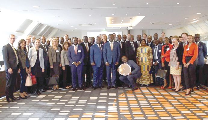 Mr Joseph Boahen Aidoo (arrowed), the Chief Executive Officer (CEO) of COCOBOD with representatives of participating banks after signing the agreement