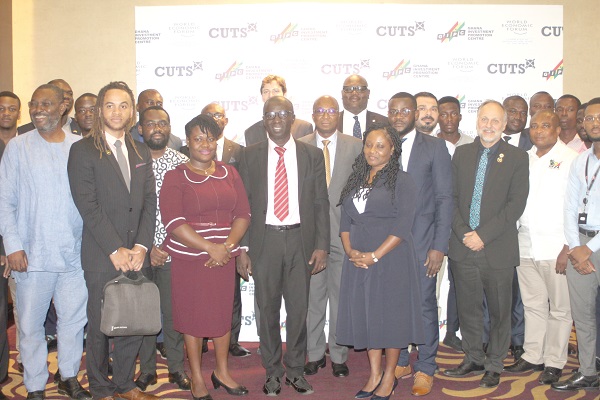 Mr Appiah Kusi Adomako (arrowed), Centre Co-ordinator of CUTS, with the participants after a meeting on investment facilitation organised by the World Economic Forum and GIPC in Accra. Picture: GABRIEL AHIABOR