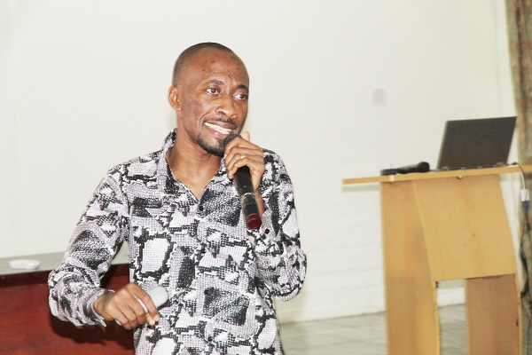 Mr Elom Hillary (left) addressing some nurses, doctors and healthcare providers at the World Patient Safety Day held at the Korle Bu Teaching Hospital in Accra. 