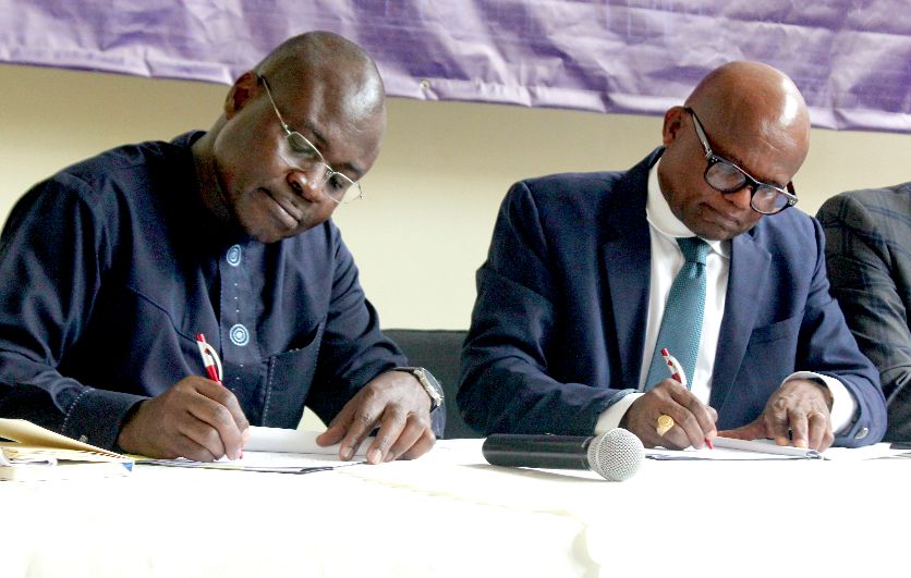  Prof Alex Dodoo (left), Director General, Ghana Standards Authority (GSA), and Dr Nana Ato Arthur (2nd left), Head of Local Government Service, signing the Memorandum of Understanding (MoU) on Decentralising Quality Infrastructure to Facilitate Trade and Project Consumers. Picture: Maxwell Ocloo