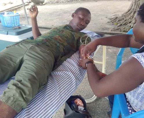 A volunteer going through the blood donation process
