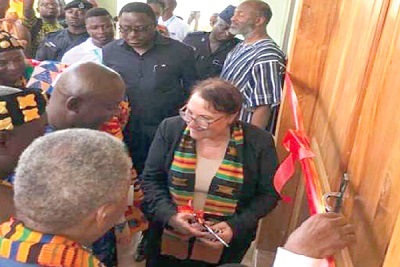 Dr Deborah Rose, Mr Japhet Aryiku and Mr Samuel Attah Akyea (arrowed) and some chiefs ready to cut the tape to signify the inauguration of the project