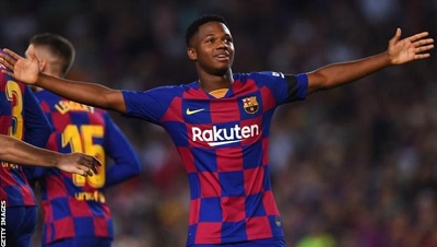Ansu Fati celebrates after opening the scoring on his first senior start for Barcelona
