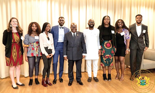  President Akufo-Addo (middle) with some  of the students who attended the lecture