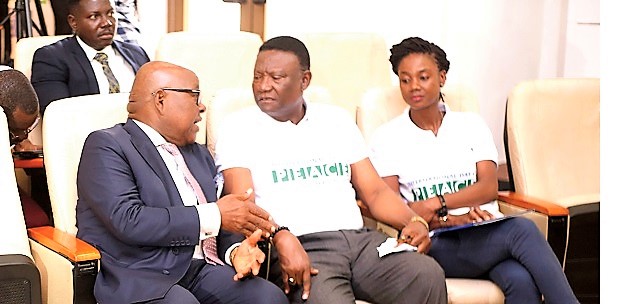  Prof. Aaron Mike Oquaye (left) in a chat with Rt Rev. Prof. Emmanuel Asante (middle), Chairman, National Peace Council, and Ms Sylvia Lopez-Ekra, UN Resident Coordinator, at the ceremony.