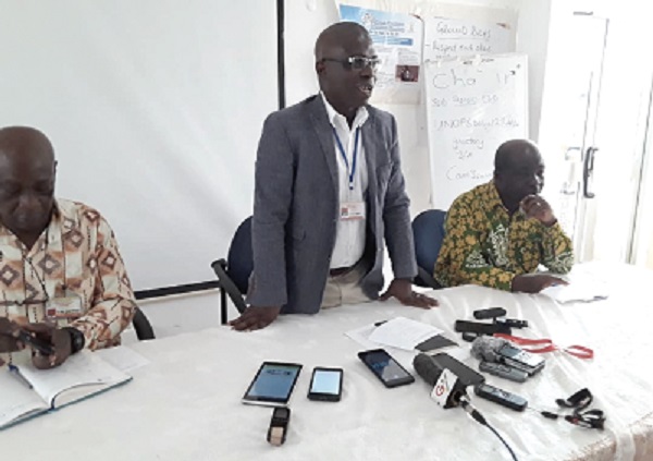 Dr Winfred Ofosu (standing), the Upper East Regional Health Director, briefing the media in Bolgatanga on the polio vaccination exercise