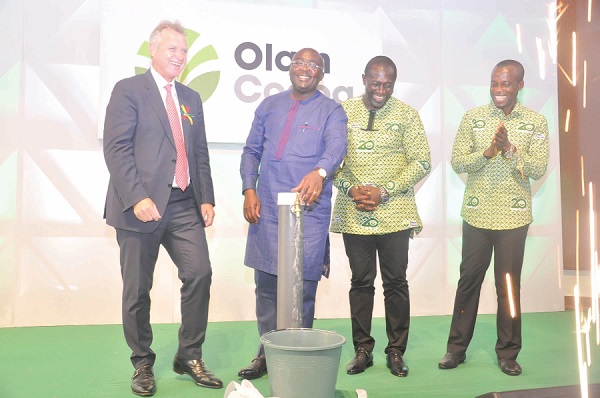 Vice-President Dr Mahamudu Bawumia (middle) launching the OLAM project in Accra. With him are Mr Gerald Manley (left), CEO,OLAM and OGEC, and Mr Eric Asare-Botwe, Business Head,OLAM Ghana.