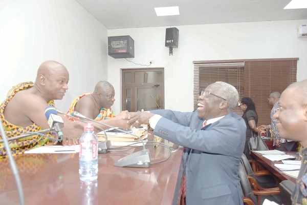 Mr Osafo-Maafo (right) being welcomed to the chamber of the house by Togbe Afede XIV  