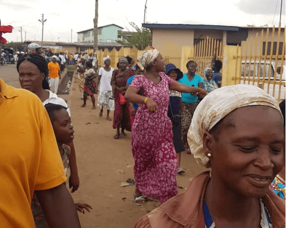 The angry parents marching to the Ashaiman Municipal Assembly to demand the release of the PTA Chairman, Mr Selase. 