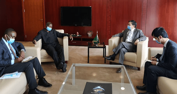 Mr Quartey (second left) in the meeting with the Chinese Ambassador to the AU, Mr Liu Yuxi.
