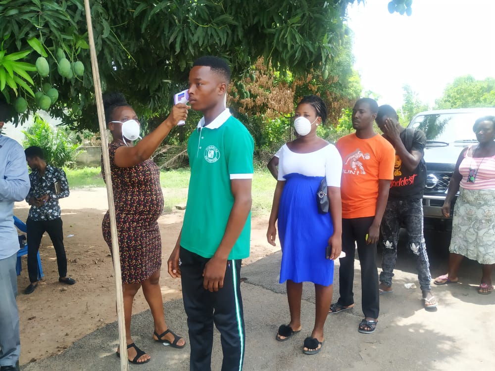 Passengers being screened at a checkpoint along the Ho- Aflao road