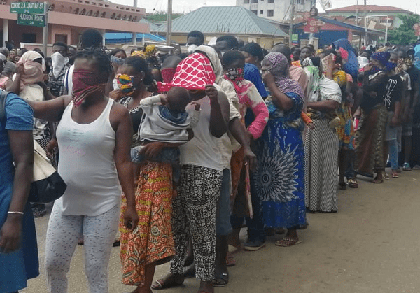 Some of the people in a queue at the McKewon Distribution Centre in Kumasi