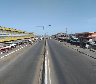The Kaneshie highway showing the Kaneshie market on the left.