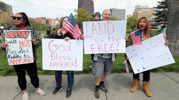 Protesters taking part in anti-lockdown demonstrations in Kansas City, Missouri