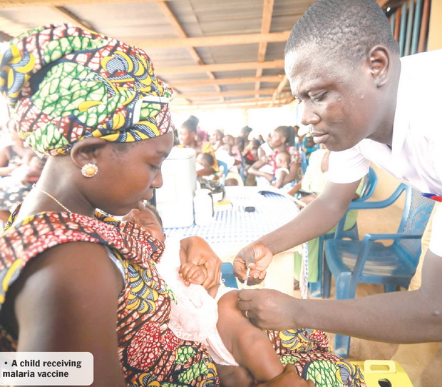 A child receiving malaria vaccine