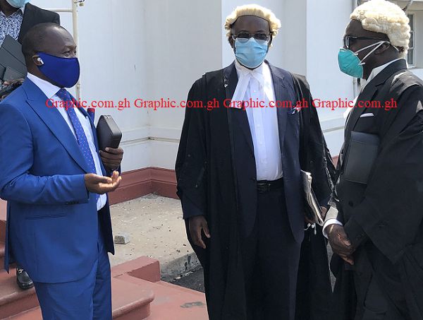The plaintiff, Dr Dominic Ayine (left), his lawyer, Mr Tony Lithur (middle) and Mr Godfred Yeboah Dame, a deputy Attorney -General after today’s court hearing.