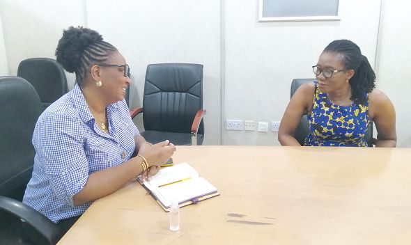 Dr Leticia Adelaide Appiah, right, speaking with Junior Graphic Editor, Doreen Hammond