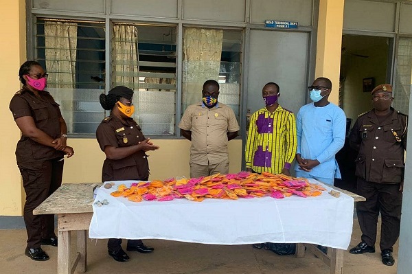Head of State Award Scheme staff donate masks to institutions