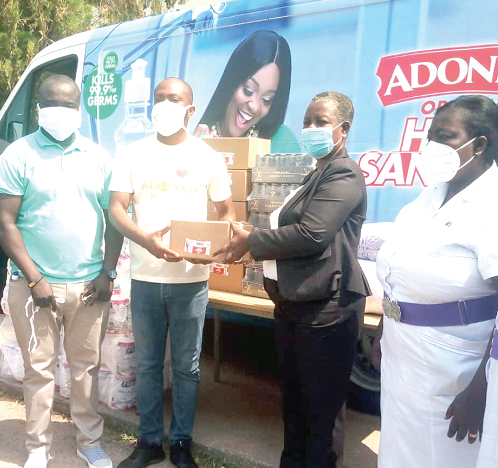 Mr Owusu Sekyere Agyemang (2nd left), the Business Development Officer of the Angel Group of Companies, making the presentation to Ms Blankson