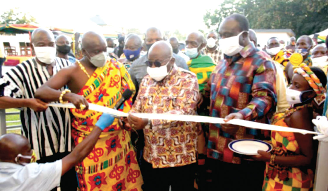 President  Akufo-Addo cutting the tape to inaugurate the Business Resource Centre. With him include Mr Alan Kyerematen (right) and Nana Ofei Addo Agyeman