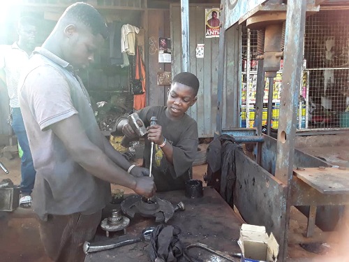 13-year-old  pupil  trains to become a mechanic during closure of schools