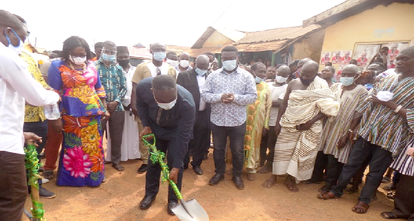 Mr William Agyapong Quaittoo (with shovel) cutting the sod for commencement of one of the seven projects.  Picture: SAMUEL KYEI-BOATENG 