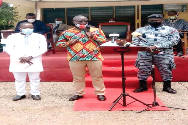 Mr Kwaku Asomah-Kyeremeh, the Minister of Lands and Natural Resources, speaking at the launch. With him is Mr Bonzo (left), the Ellembelle District Chief Executive