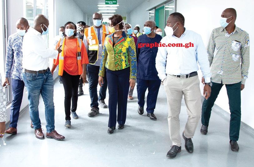 Justice Sophia Akuffo (3rd right) and some members of the fund being conducted round the centre