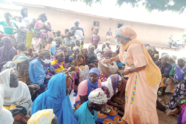  Mrs Cynthia Morrison interracting with the inmates of the Gnani witches camp during the visit