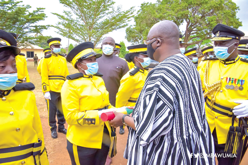 Vice-President Dr Bawumia presenting the Best-All-Round Officer Cadet award to Senior Under Officer Dr Florence Djoletoe 