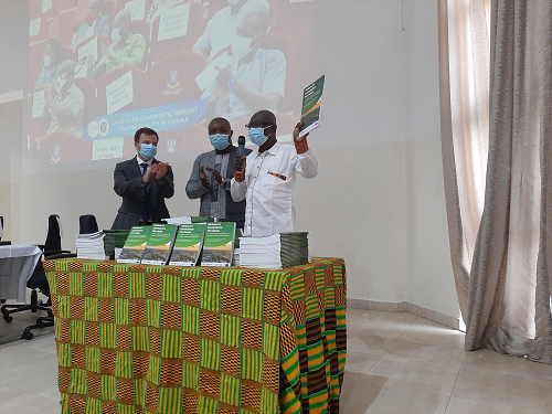   The Pro-Vice-Chancellor of the Office of Research, Innovation and Development (ORID) at the University of Ghana, Professor Felix Asante (in white shirt) launching the report. With him are Prof. Robert Darko Osei (middle), Coordinator of the ACEIR Ghana Node, and Dr Christophe Cottet, Country Director of Agence Française de Développement (AfD).
