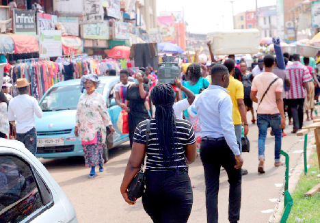Some residents of Kumasi going about their normal duties
