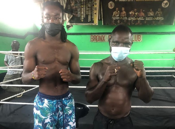 Eslih Owusu (left) with Benjamin Ankrah after their weigh-in session