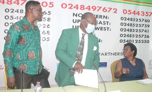 Dr Emmanuel Akwetey (left) Major General (rtd) Carl Coleman (middle), Chairman and Dr Angela Dwamena-Aboagye interacting after the press conference. Picture: Maxwell Ocloo