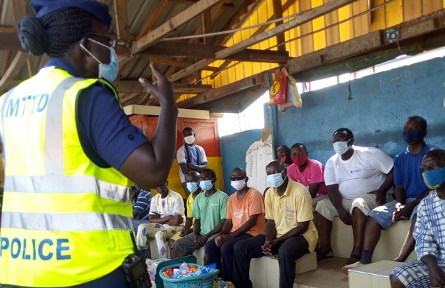 DSP Mrs Stella  Ewool, Kpeshie Divisional MTTD Commander interacting with some of the drivers