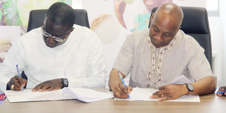  Dr Kadri Alfah (right), and Nana Abeyie Siriboe signing the Memorandum of Understanding. Pictures: EDNA SALVO-KOTEY