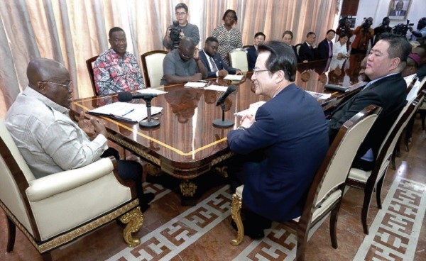   President Akufo-Addo in a discussion with Rev. Dr Jung-Hyun Oh (right), Senior Pastor, Sarang Church. 