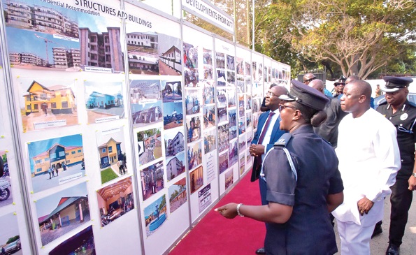 Vice-President Mahamudu Bawumia viewing some pictures on display at the 2019 Police WASSA in Accra yesterday. Those with him include Mr Dominic Nitiwul (right), the Minister of Defence