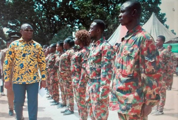  Mr Amoakohene inspecting a guard of honour mounted in his honour by the fire volunteer squad