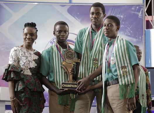 FLASBACK: Dr Elsie Effah Kaufmann (left), the Quiz Mistress, with the winners of the 2019 National Science and Maths Quiz, St Augustine’s College